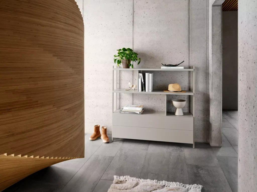 Meble modułowe regał w przedpokoju minimalistyczne wnętrze funkcjonalne przechowywanie