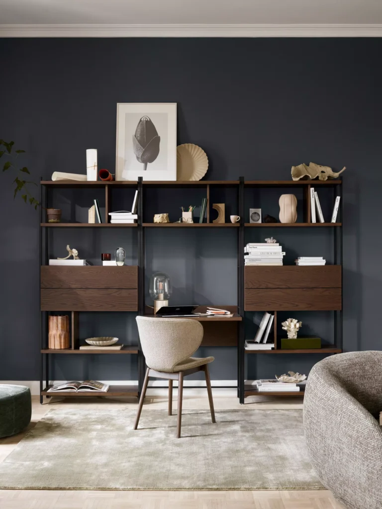 Meble modułowe regał z biurkiem w salonie nowoczesny home office aranżacja wnętrza